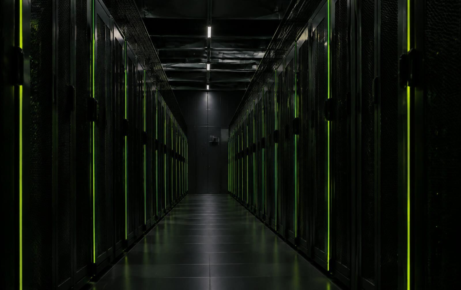 Data center corridor lined with server racks